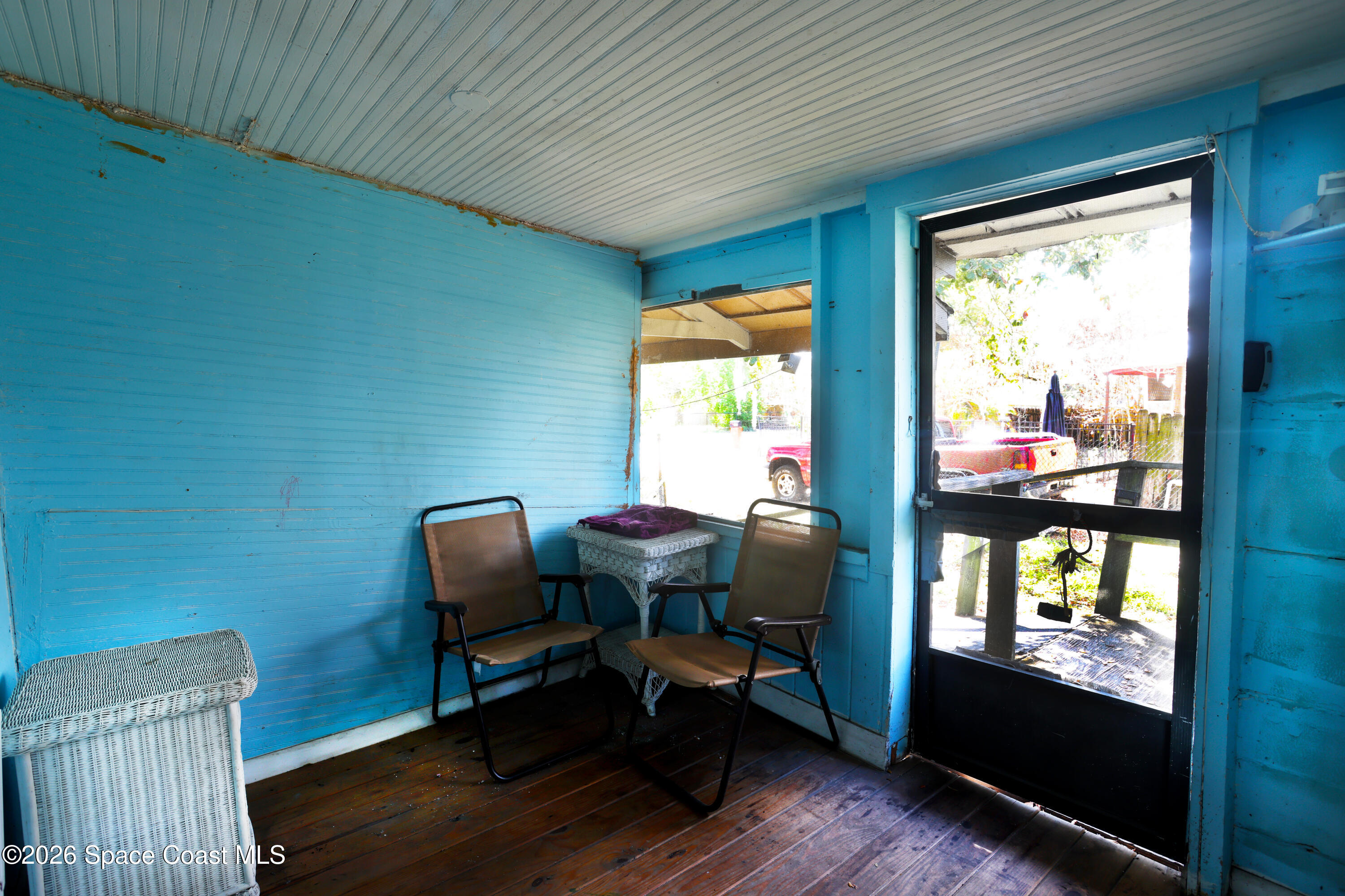 317 Pineda Street, Unit B Cocoa, FL 32922 - Photo 19 of 19 a view of a workspace with furniture and a window