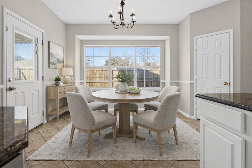 770 Whitman Drive Allen, TX 75002 - Photo 13 of 38 a view of a dining room with furniture window and outside view