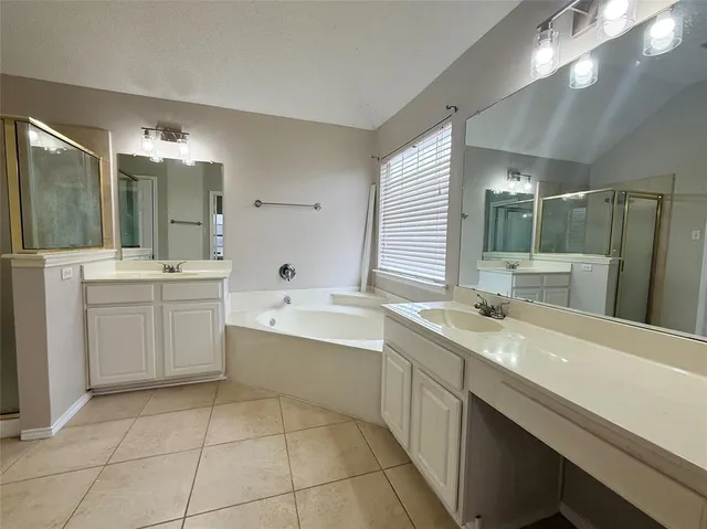 an empty room with a fireplace