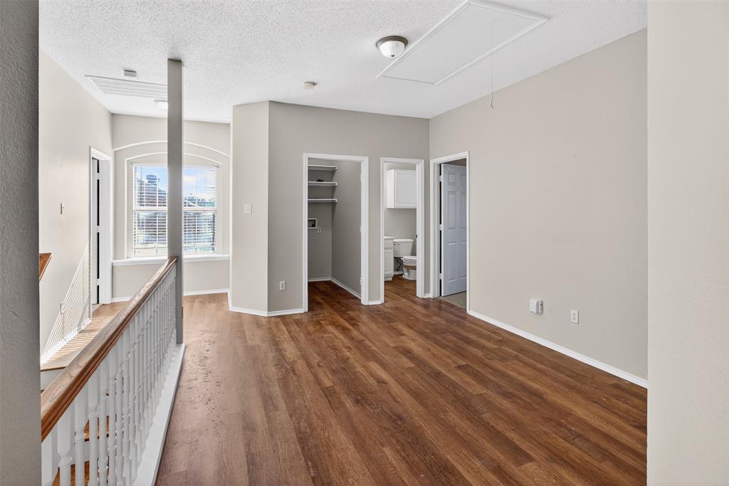 770 Whitman Drive Allen, TX 75002 - Photo 23 of 38 Loft style gameroom with luxury vinyl wood-look flooring