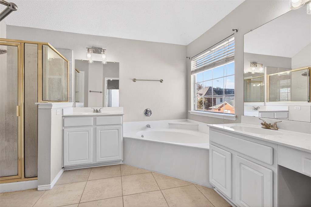 770 Whitman Drive Allen, TX 75002 - Photo 30 of 38 Primary ensuite has separate vanities, large tub and separate shower