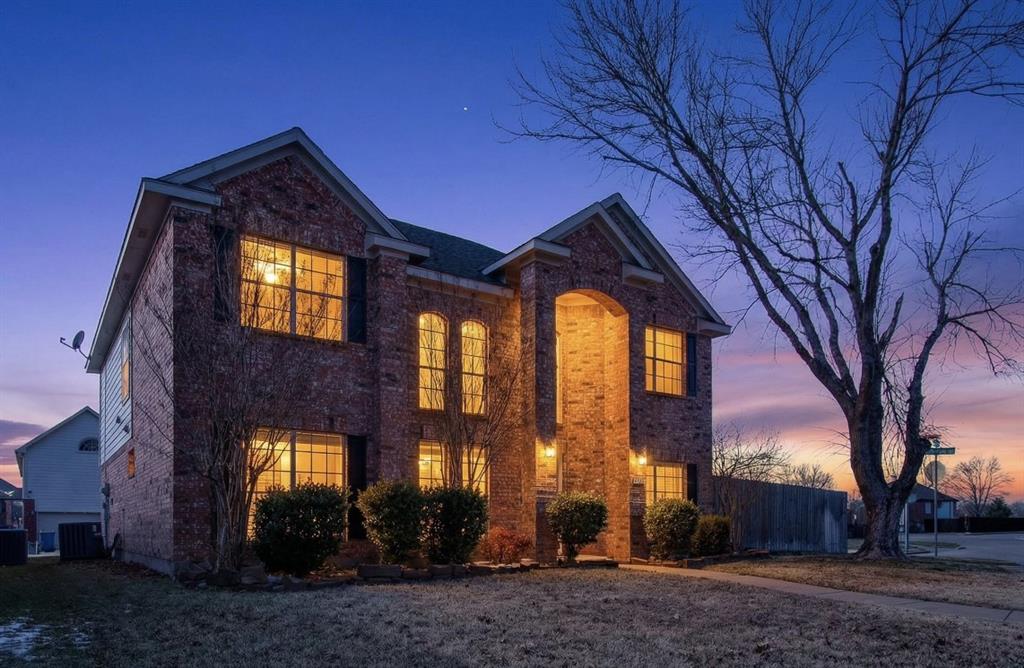 770 Whitman Drive Allen, TX 75002 - Photo 3 of 38 a front view of house with a yard