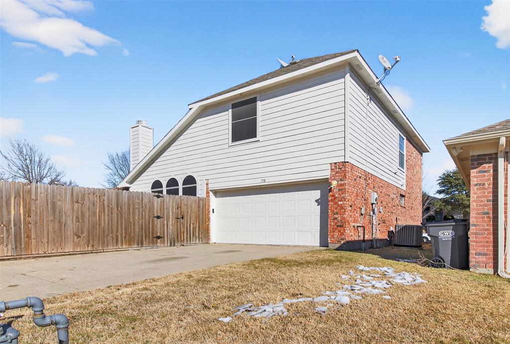 770 Whitman Drive Allen, TX 75002 - Photo 35 of 38 driveway and garage in the back