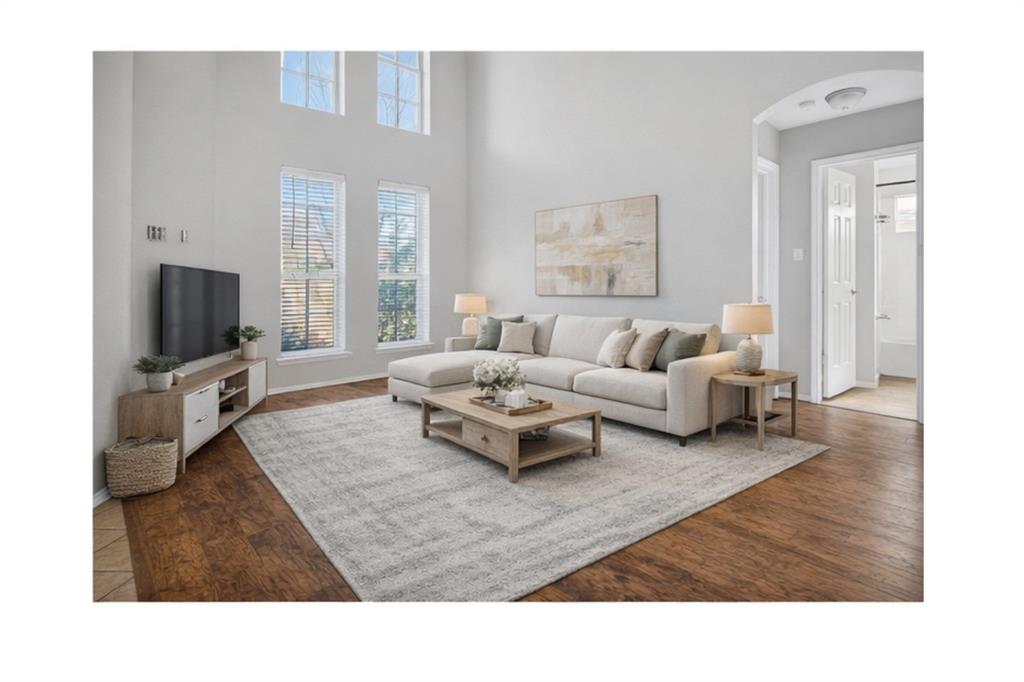 770 Whitman Drive Allen, TX 75002 - Photo 4 of 38 a living room with furniture flat screen tv and a window