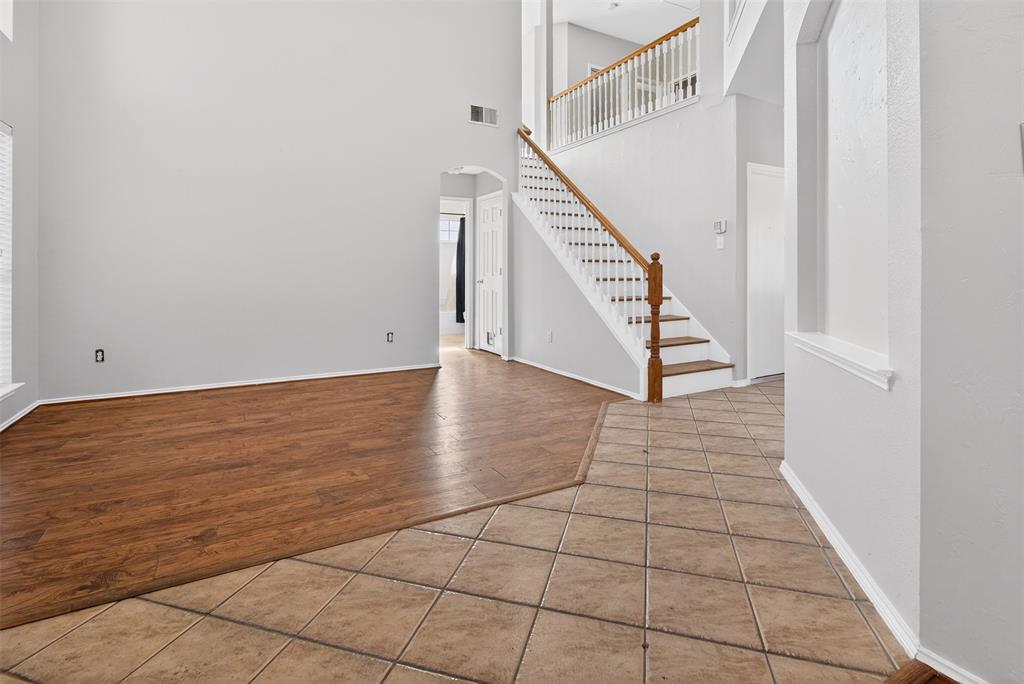 770 Whitman Drive Allen, TX 75002 - Photo 8 of 38 Enter into the formal living with tall ceilings