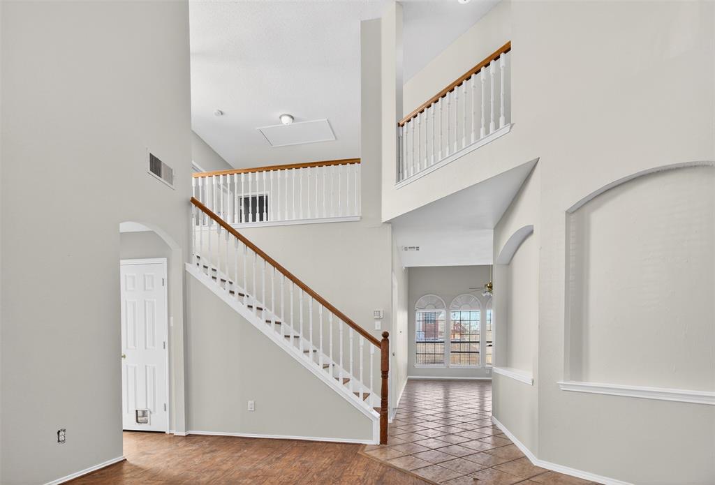 770 Whitman Drive Allen, TX 75002 - Photo 9 of 38 a view of staircase with white walls and white walls