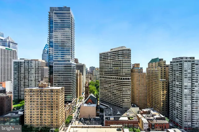 a city view with tall buildings