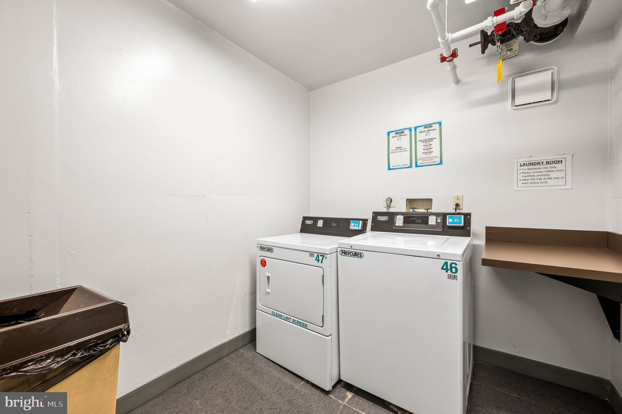 2020 Walnut Street, Unit 29D Philadelphia, PA 19103 - Photo 21 of 40 a utility room with dryer and washer