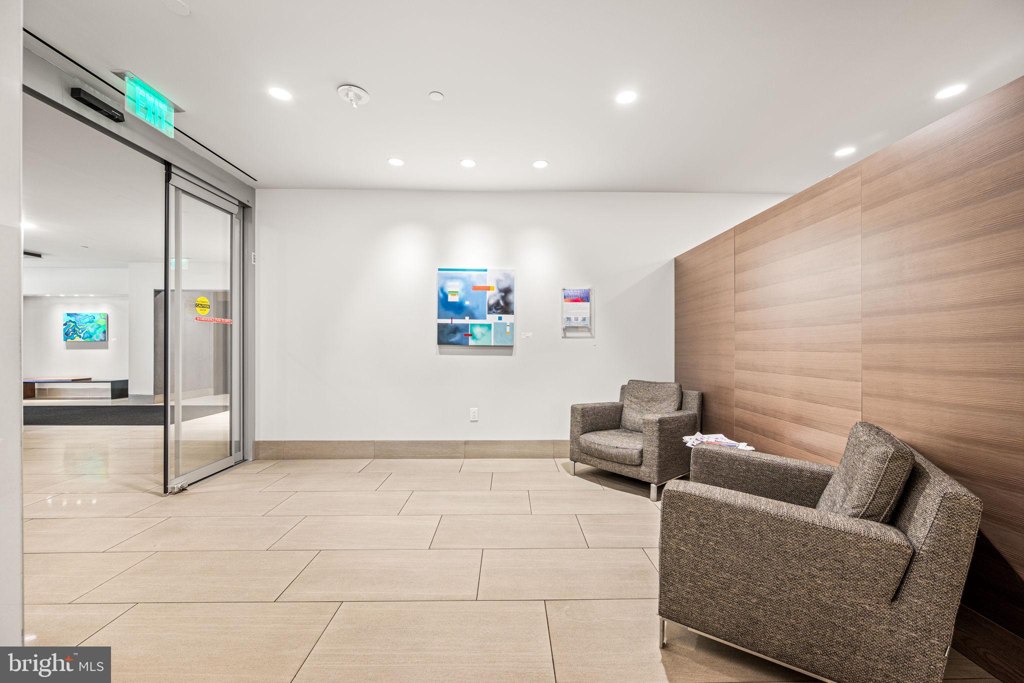 2020 Walnut Street, Unit 29D Philadelphia, PA 19103 - Photo 37 of 40 a living room with furniture and a flat screen tv