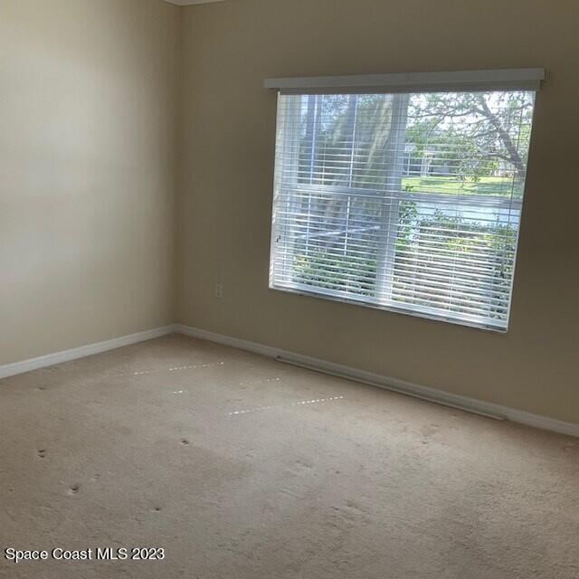 3551 Funston Circle Melbourne, FL 32940 - Photo 16 of 25 a view of an empty room with a window