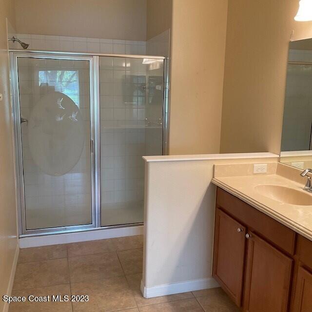 3551 Funston Circle Melbourne, FL 32940 - Photo 18 of 25 a bathroom with a sink and a mirror