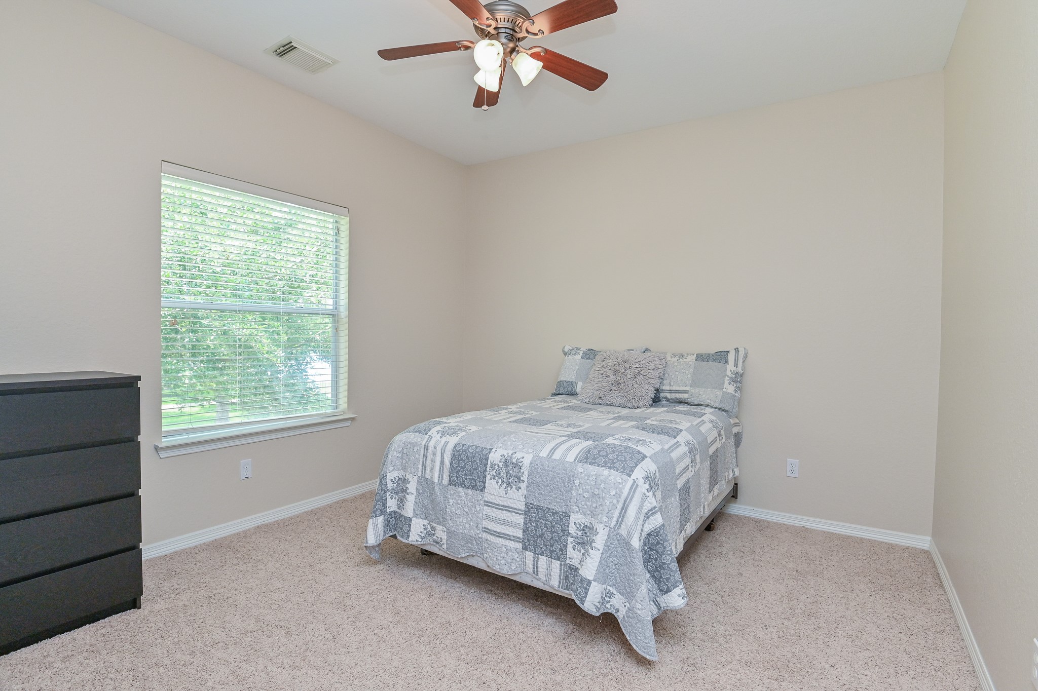 7218 Spring Run Lane Katy, TX 77494 - Photo 27 of 49 a bedroom with a bed and window