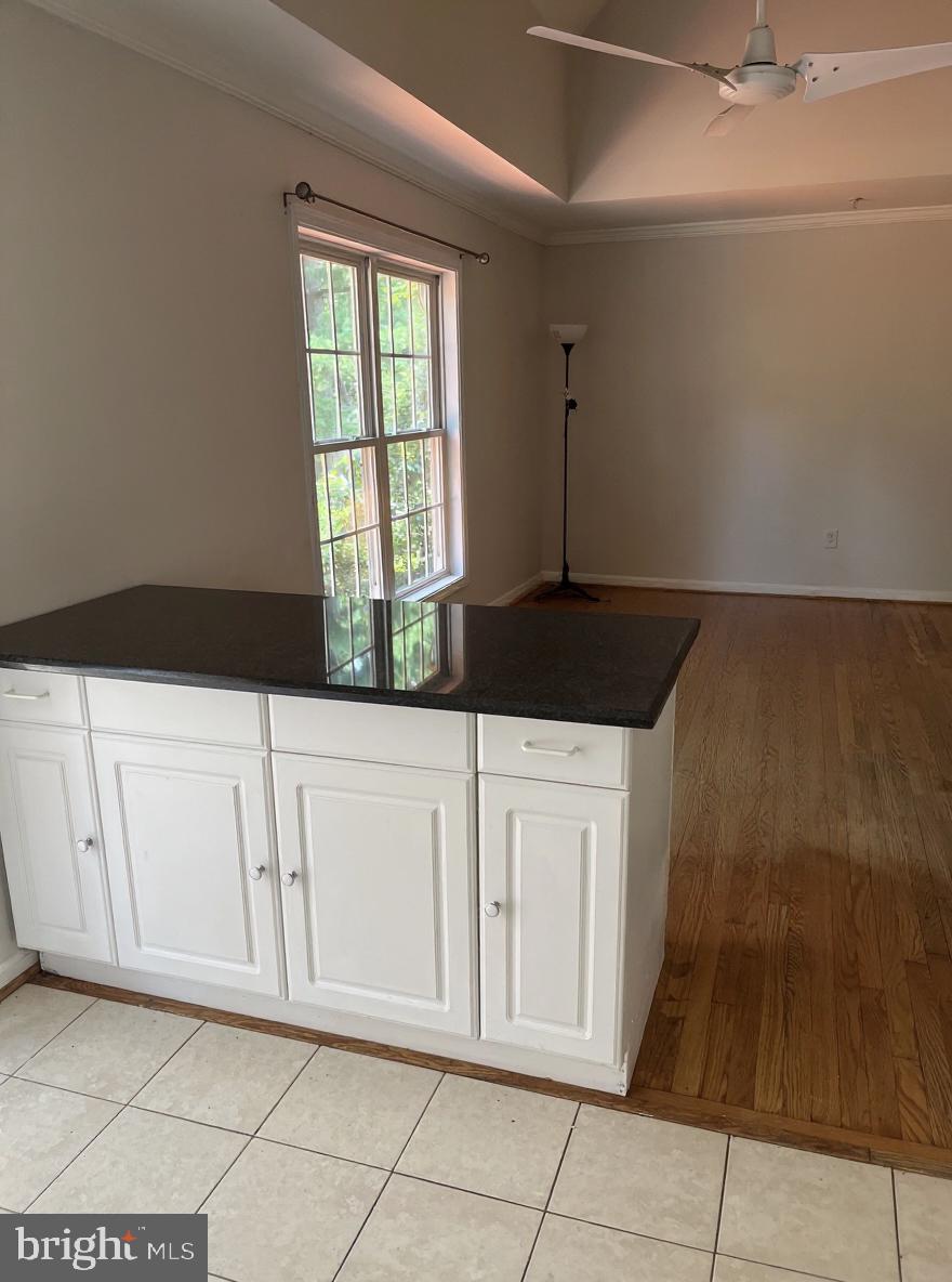 7502 Contee Road Laurel, MD 20707 - Photo 7 of 18 a kitchen with white cabinets