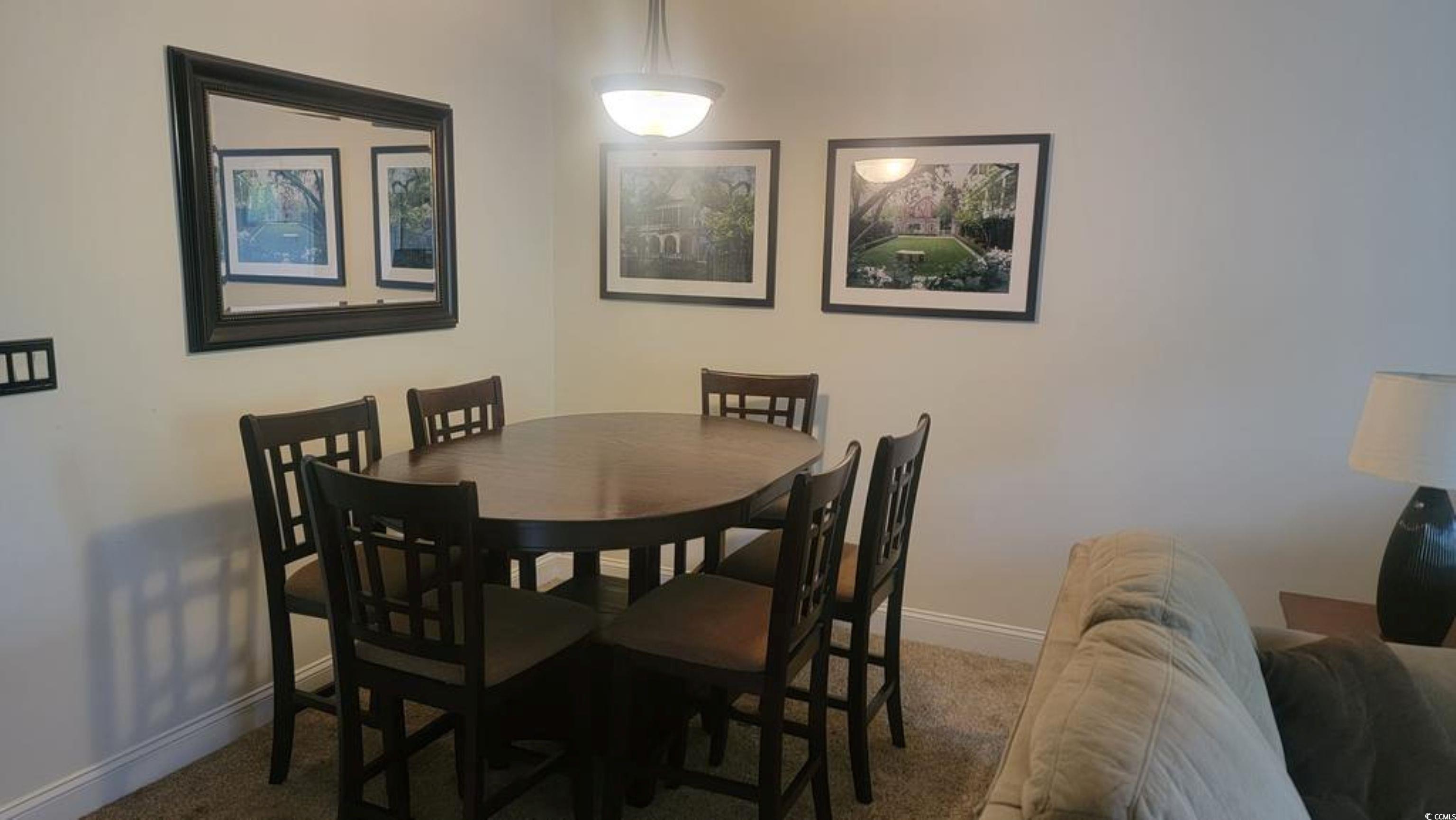 6000 Windsor Green Way, Unit 11202 Myrtle Beach, SC 29579 - Photo 4 of 10 Dining room with baseboards and carpet flooring