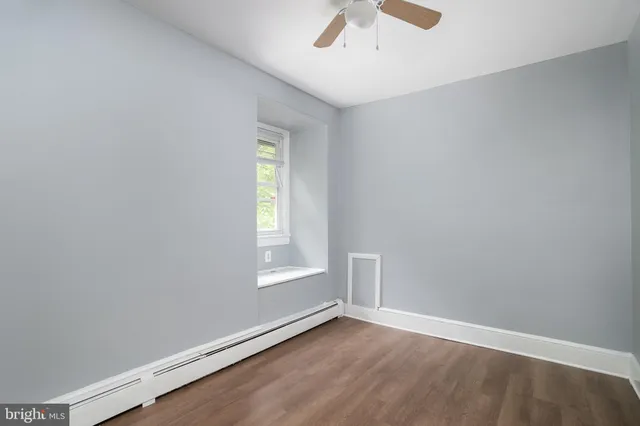 an empty room with window