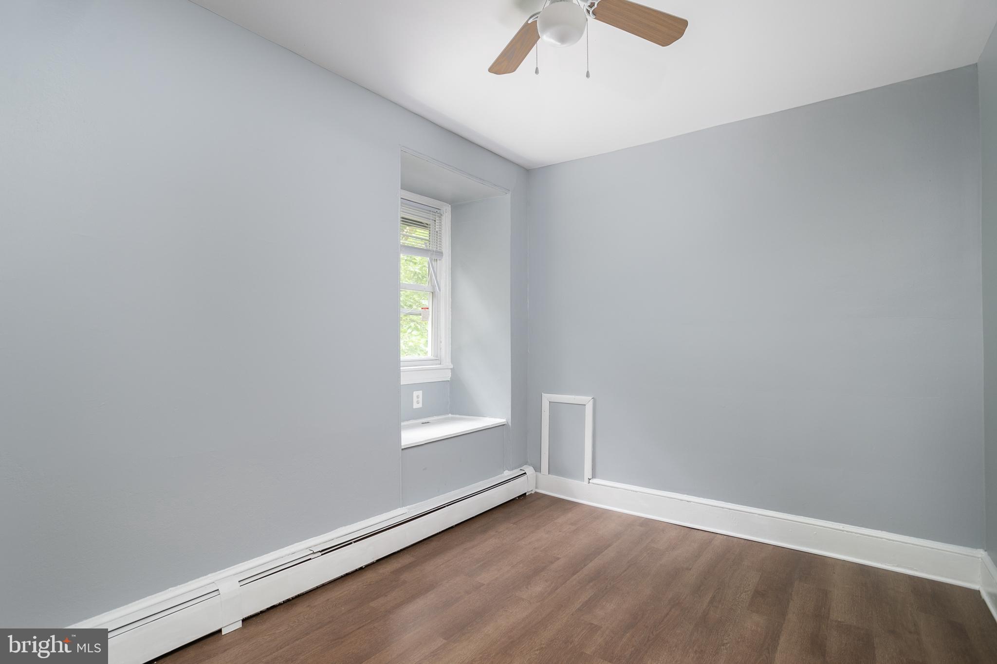 117 East Walnut Avenue, Unit E Merchantville, NJ 08109 - Photo 13 of 22 an empty room with window