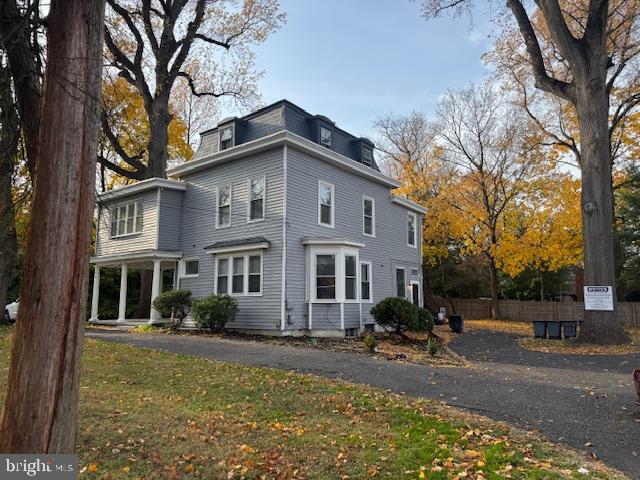 117 East Walnut Avenue, Unit E Merchantville, NJ 08109 - Photo 22 of 22 a front view of a house with garden