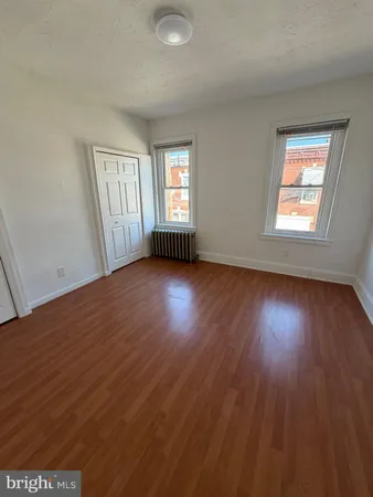 a view of room with wooden ceiling