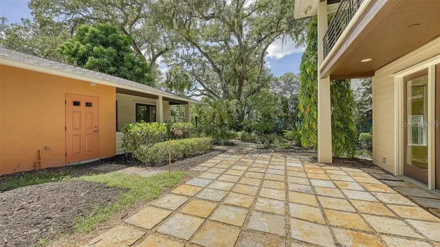 a view of a backyard with garden