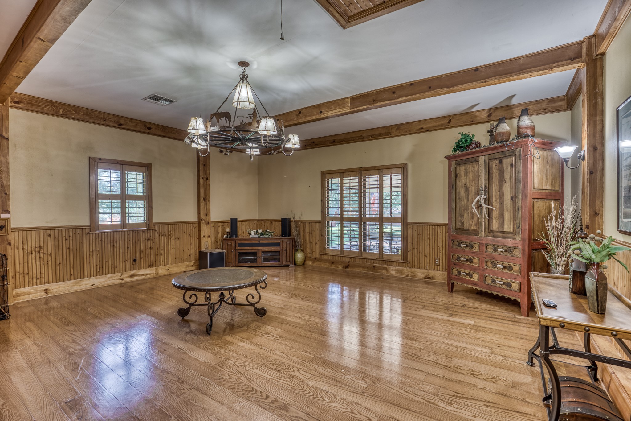 1017 Allen Road Cat Spring, TX 78933 - Photo 15 of 47 a living room with furniture and a chandelier