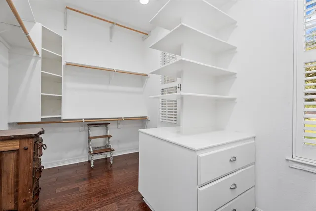 a view of cabinets and wooden floor