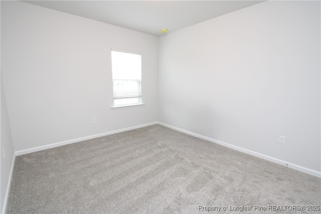461 Grange Farm Place Raleigh, NC 27603 - Photo 15 of 50 an empty room with a window