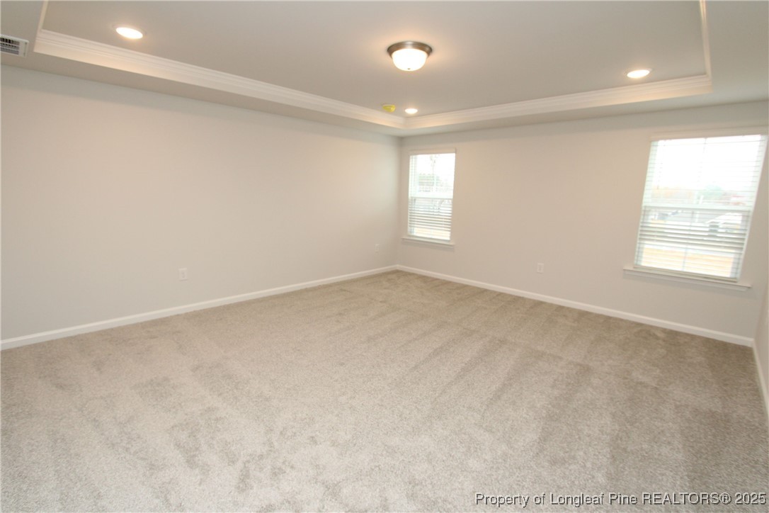 461 Grange Farm Place Raleigh, NC 27603 - Photo 21 of 50 an empty room with windows