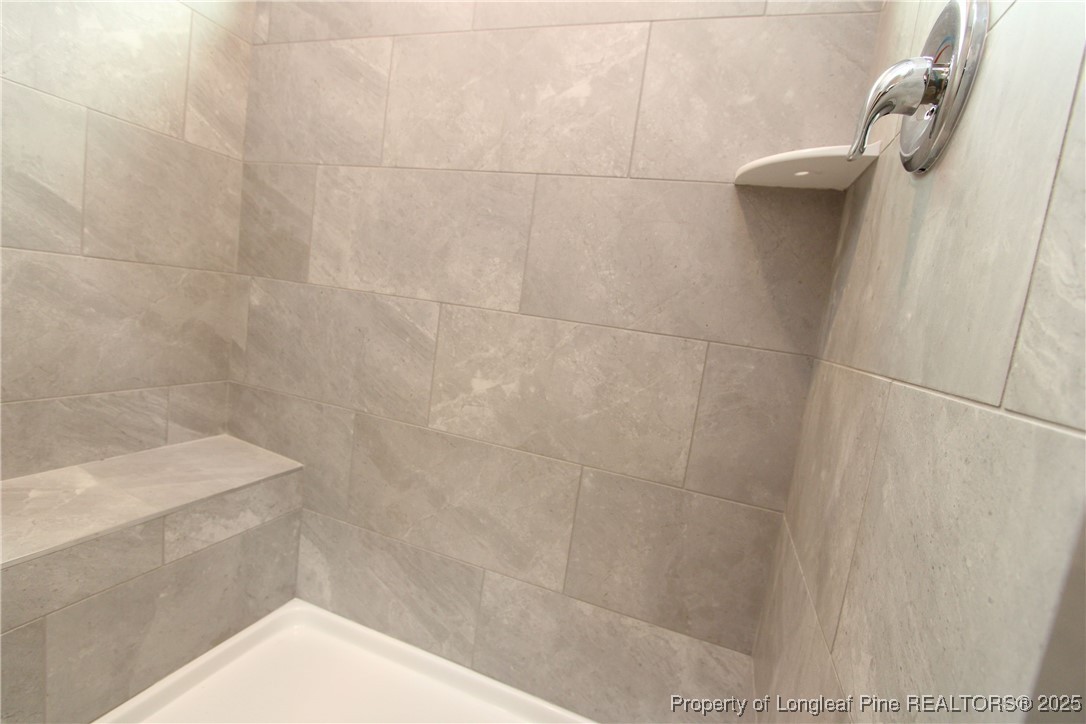 461 Grange Farm Place Raleigh, NC 27603 - Photo 26 of 50 a bathroom with a shower