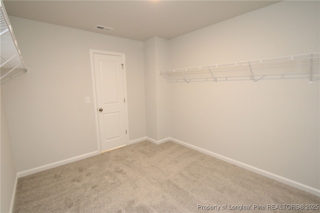 461 Grange Farm Place Raleigh, NC 27603 - Photo 28 of 50 a view of an empty room