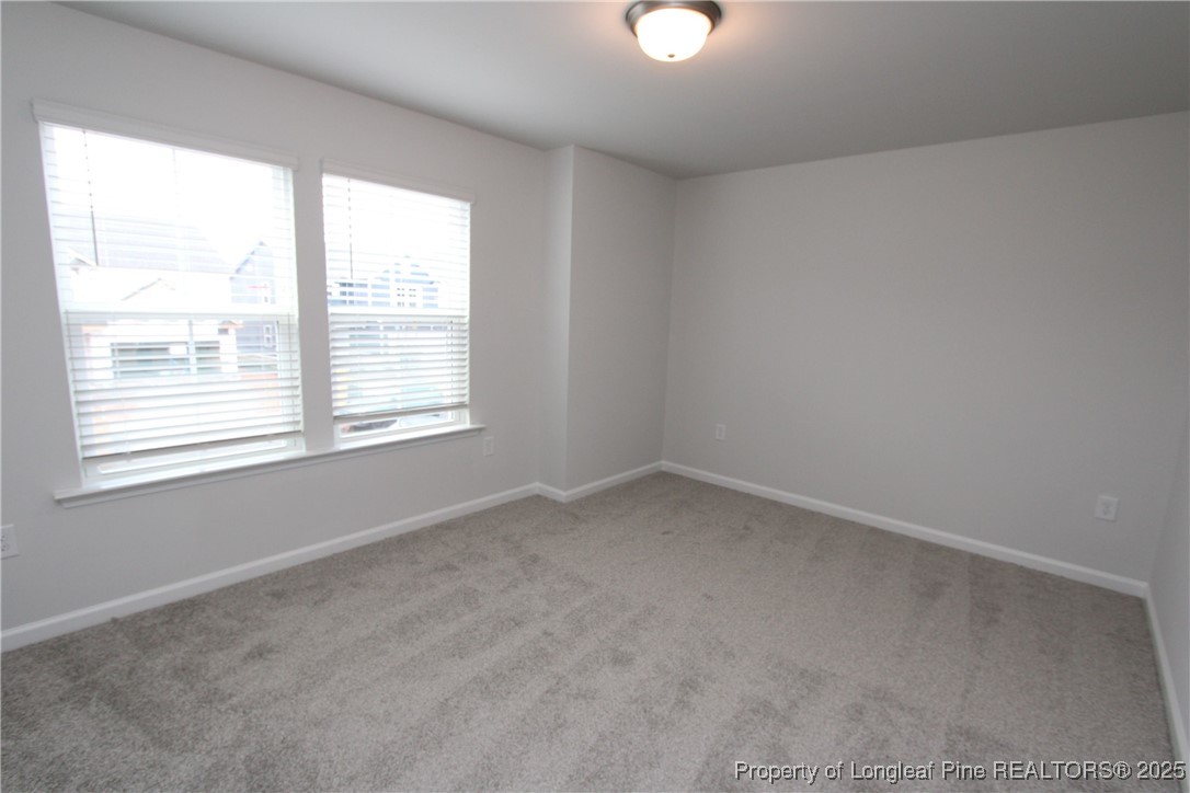 461 Grange Farm Place Raleigh, NC 27603 - Photo 35 of 50 an empty room with a window