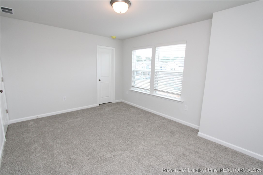 461 Grange Farm Place Raleigh, NC 27603 - Photo 36 of 50 an empty room with a window