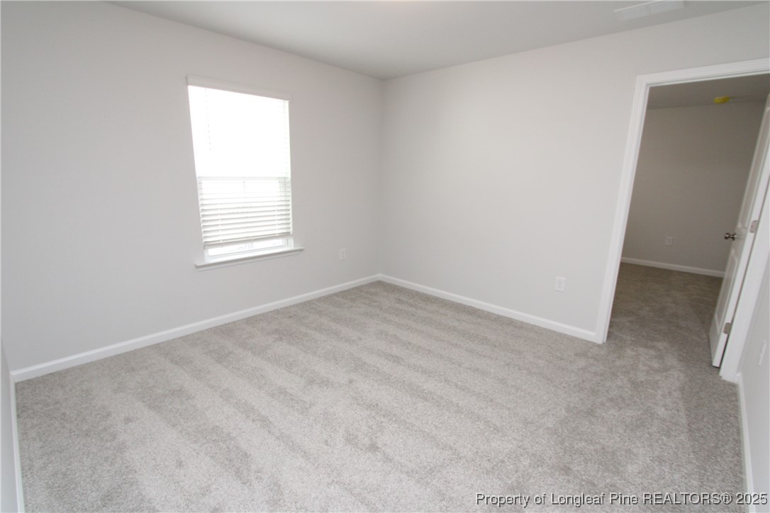 461 Grange Farm Place Raleigh, NC 27603 - Photo 41 of 50 an empty room with a window