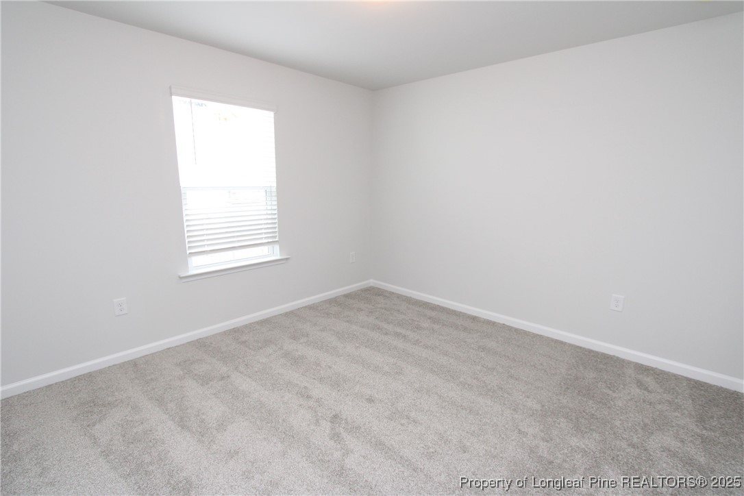 461 Grange Farm Place Raleigh, NC 27603 - Photo 43 of 50 an empty room with a window