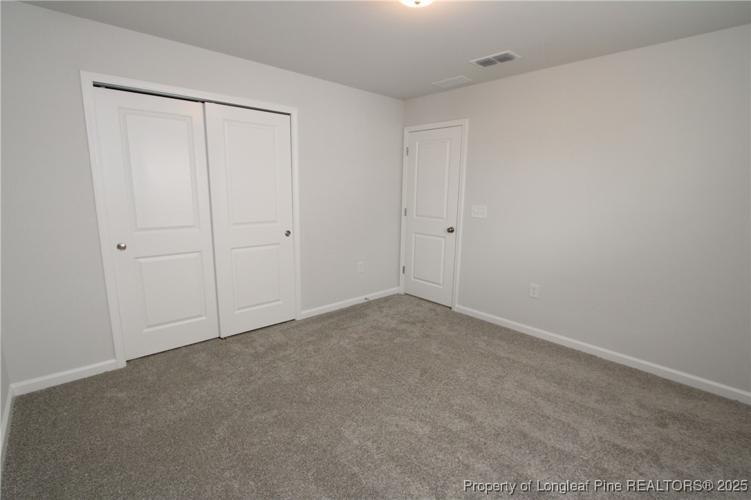 461 Grange Farm Place Raleigh, NC 27603 - Photo 45 of 50 a view of an empty room