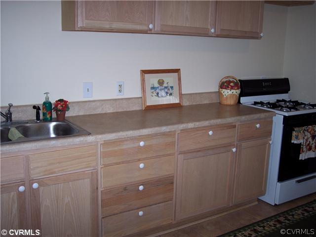 3273 Grandy Road Brodnax, VA 23920 - Photo 3 of 11 Kitchen - New Tile, New cabinets, Fresh Paint