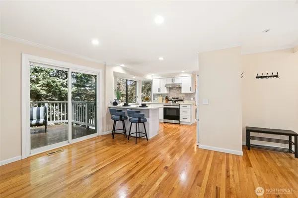 a living room with furniture and a table