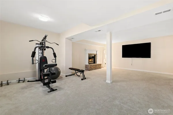 a view of a room with gym equipment