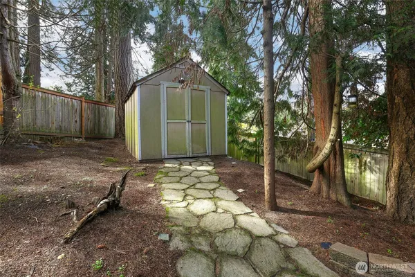 a backyard of a house with lots of green space