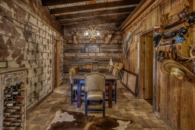 a view of a chairs and table in a patio
