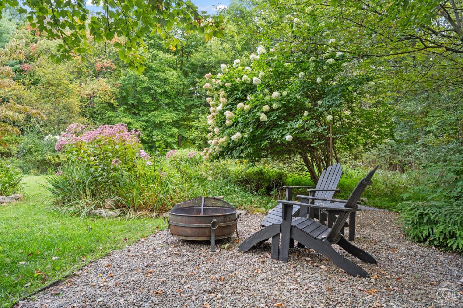 1487 County Rte 27 Craryville, NY 12521 - Photo 20 of 27 a view of a backyard with sitting area