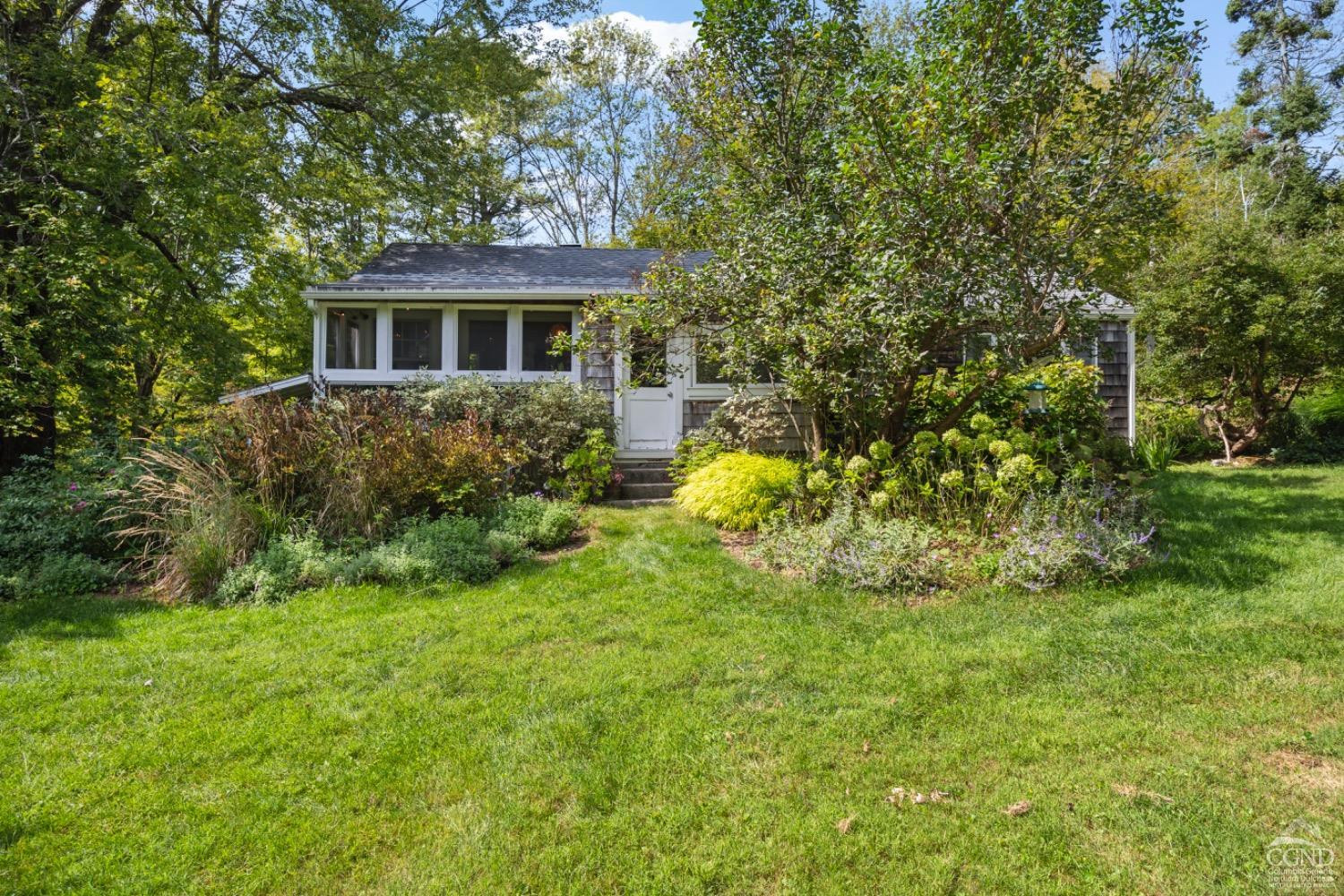 1487 County Rte 27 Craryville, NY 12521 - Photo 2 of 27 a front view of house with yard and green space