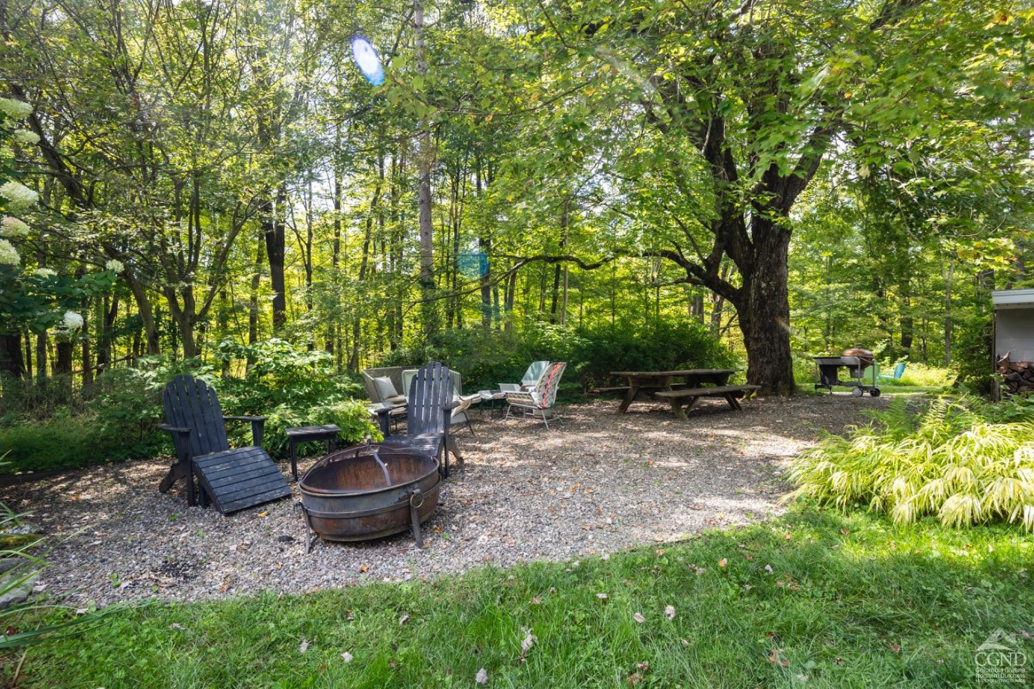 1487 County Rte 27 Craryville, NY 12521 - Photo 21 of 27 a view of a backyard with garden and plants