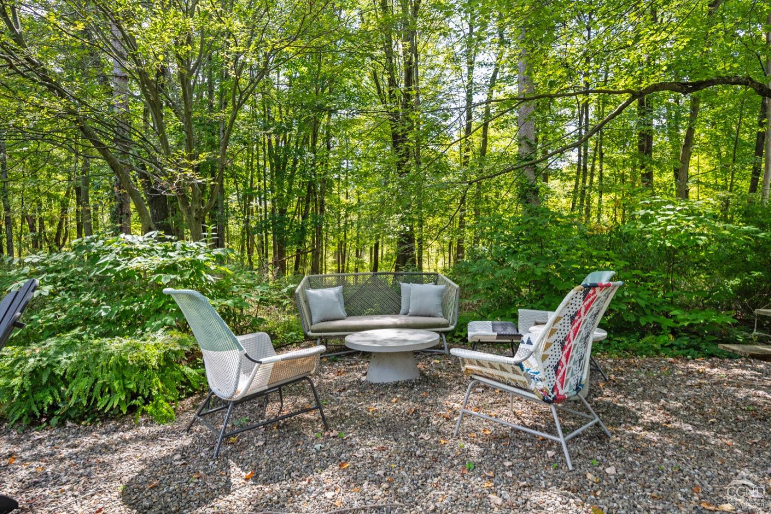1487 County Rte 27 Craryville, NY 12521 - Photo 22 of 27 a white bench sitting in a backyard
