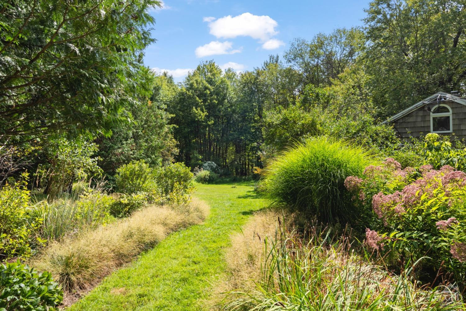 1487 County Rte 27 Craryville, NY 12521 - Photo 4 of 27 a view of a garden