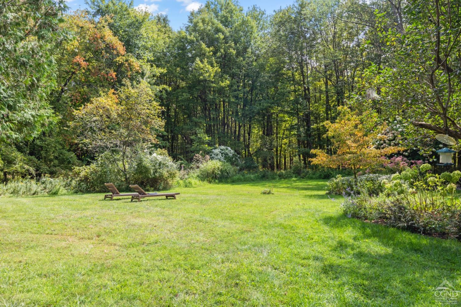 1487 County Rte 27 Craryville, NY 12521 - Photo 5 of 27 a view of outdoor space with a garden and trees