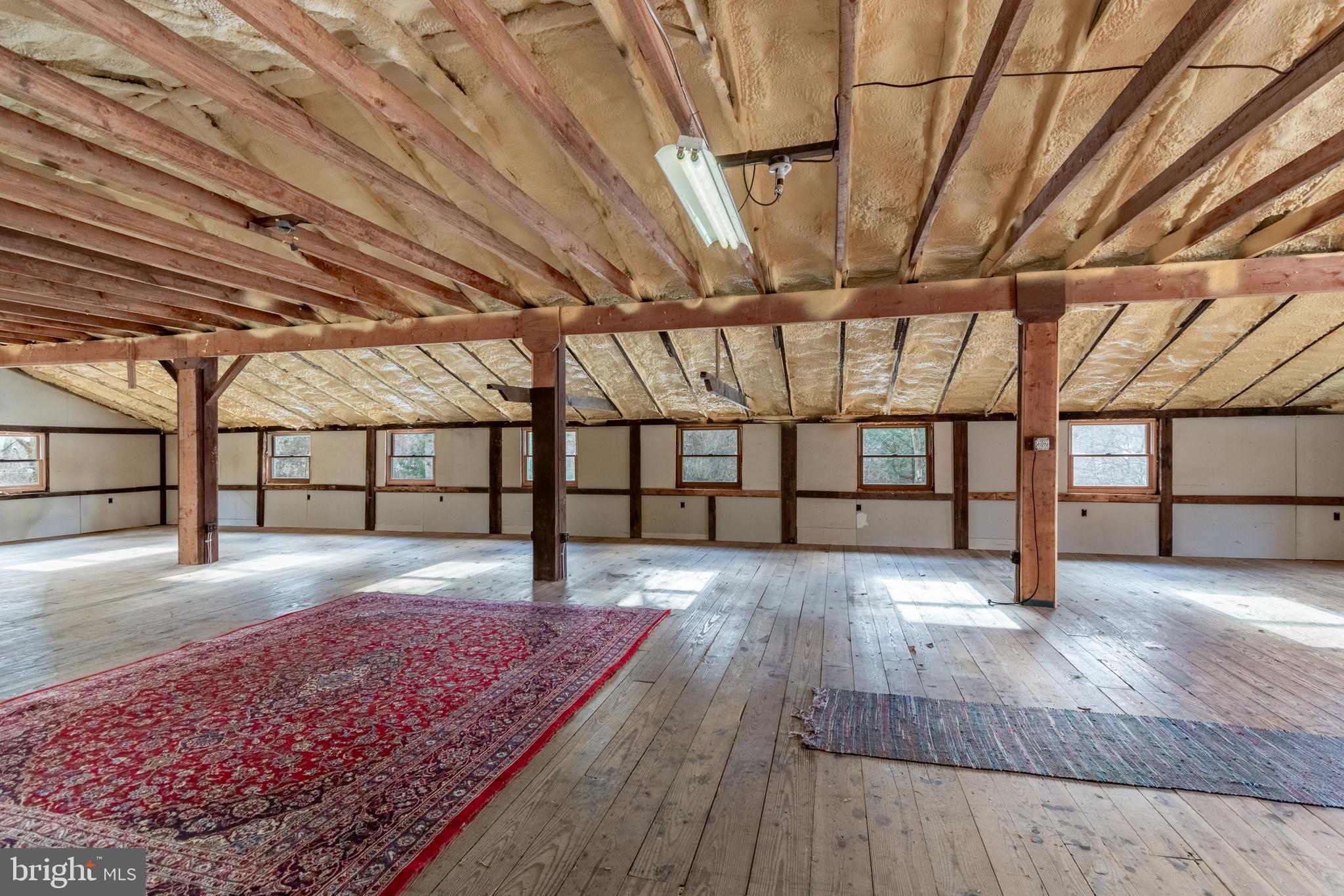 25 Risler Street Stockton, NJ 08559 - Photo 13 of 36 a view of a hallway with wooden floor