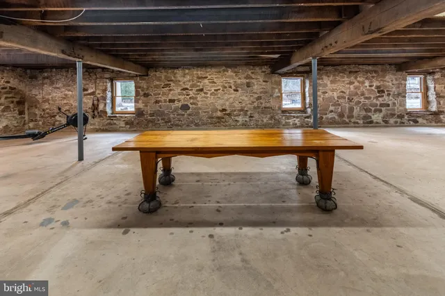 a view of a couches and table in a patio