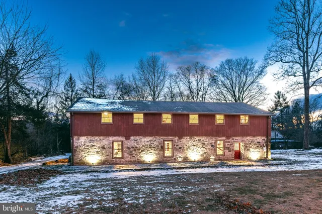 a view of a building with a yard