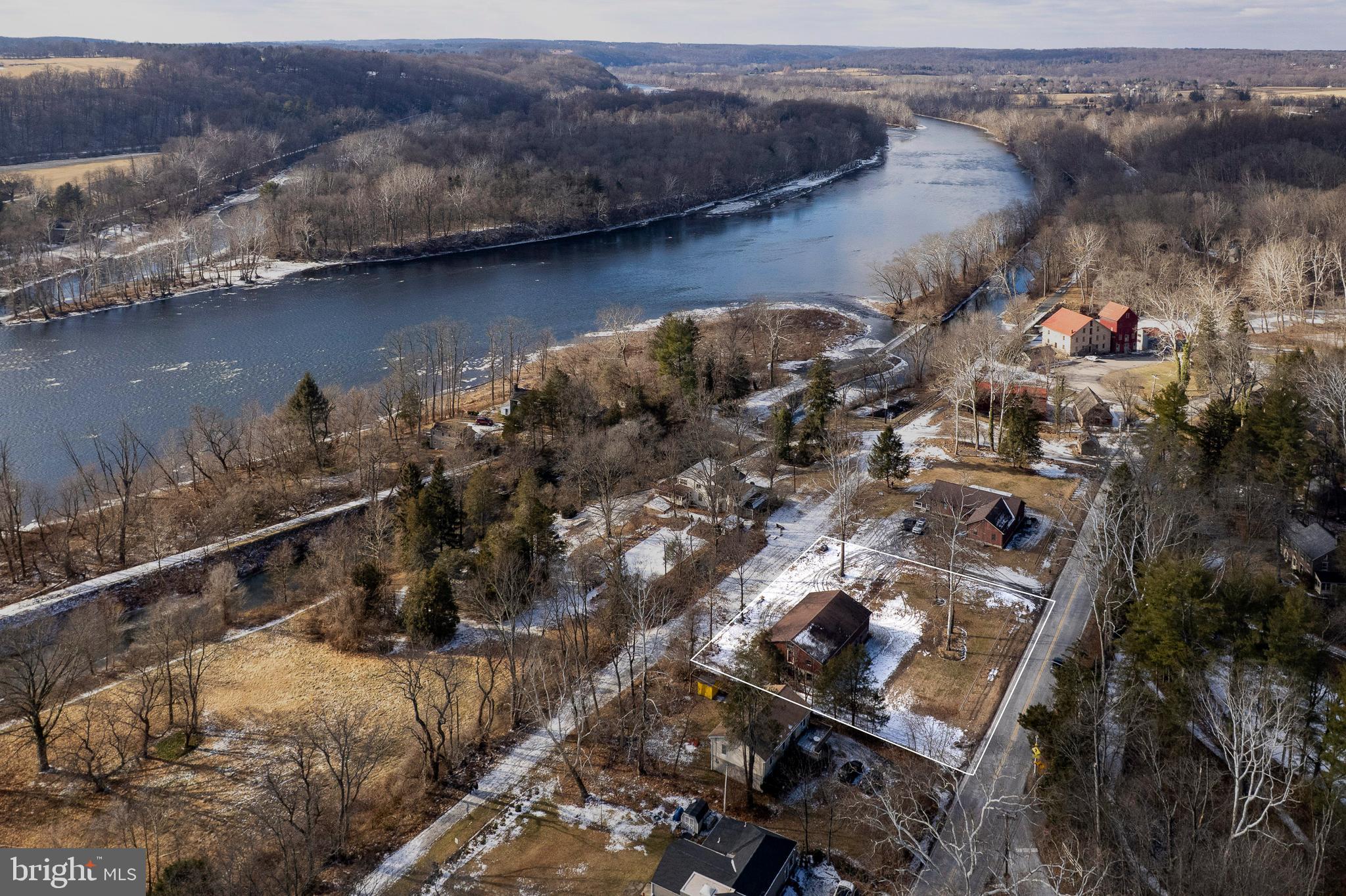 25 Risler Street Stockton, NJ 08559 - Photo 27 of 36 an aerial view of a house with a yard and lake view