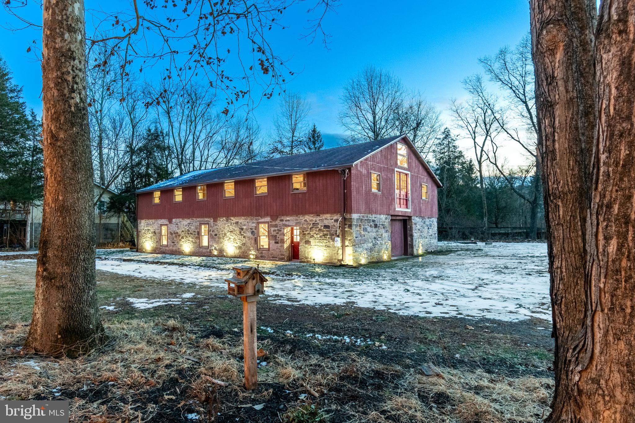 25 Risler Street Stockton, NJ 08559 - Photo 3 of 36 a view of a house with backyard and trees